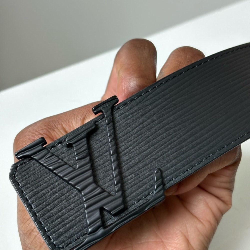 Authentic Louis Vuitton Black Belt size 36 belt (32waist). Only worn twice.